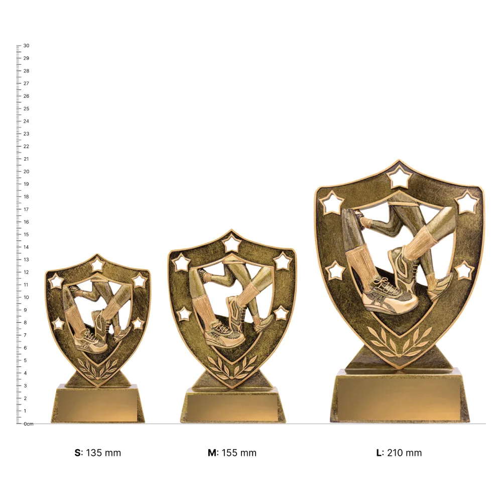 Athletics Gold Shield trophies next to ruler