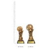 Budget Raised Ball trophies next to ruler