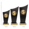 Dollar Spartan Crest trophies next to ruler