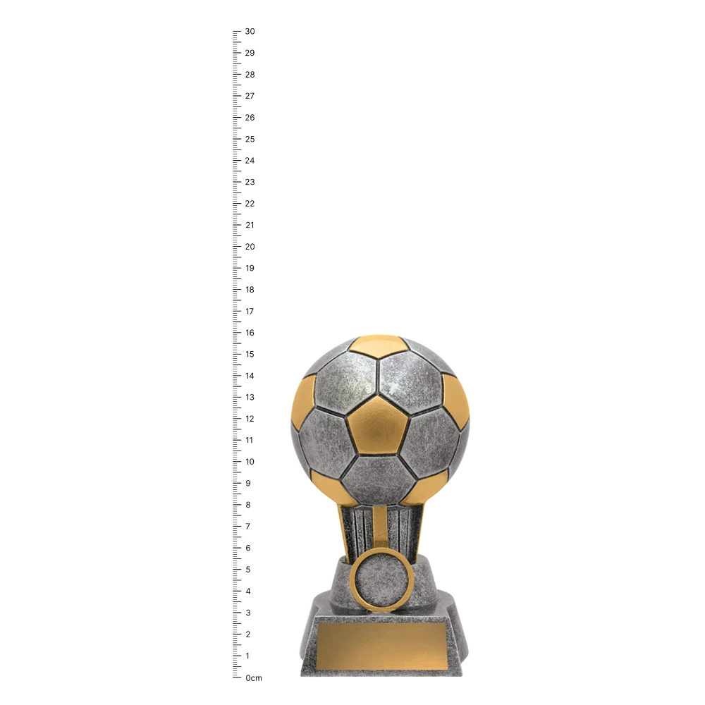 Football Salvo trophy next to ruler