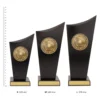 Football Spartan Crest trophies next to ruler