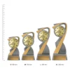 Music Arclight Gold trophies next to ruler
