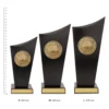 Netball Spartan Crest trophies next to ruler
