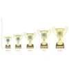 Signal Cup trophies next to ruler