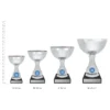 Silver Lucca trophies next to ruler