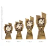 Spelling Antique Gold Lynx trophies next to ruler