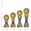 Spelling Bee IKON trophies next to ruler