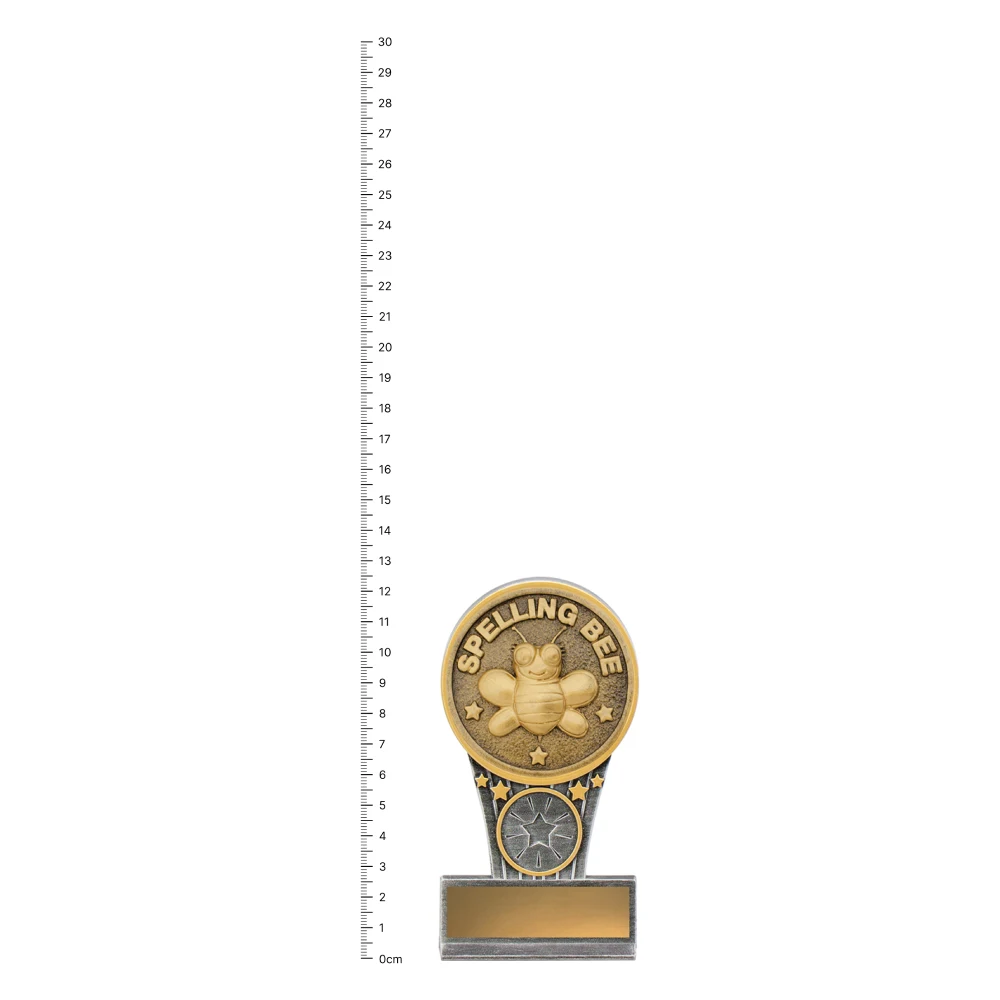 Spelling Bee Mini IKON trophy next to ruler