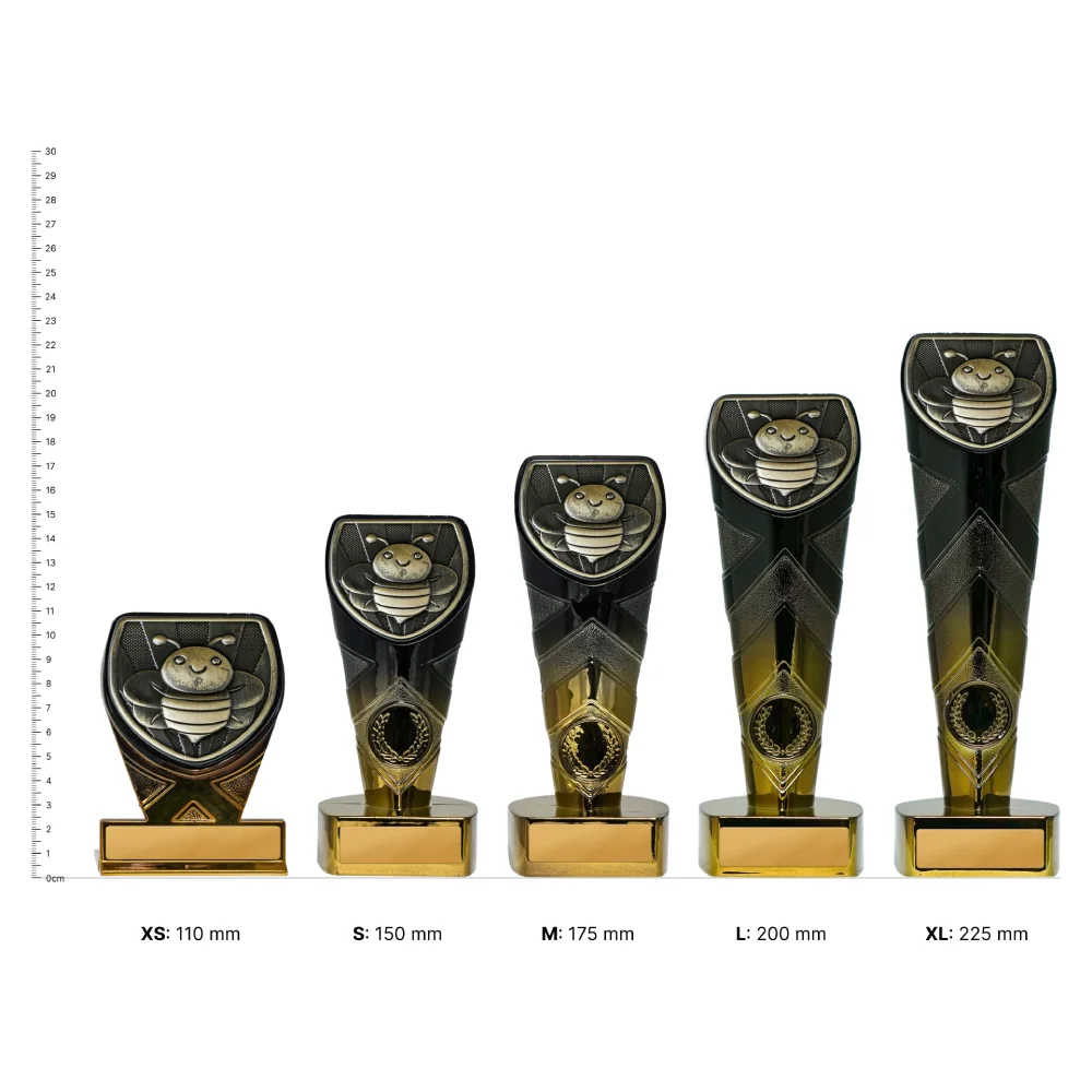 Spelling Fusion Cobra trophies next to ruler