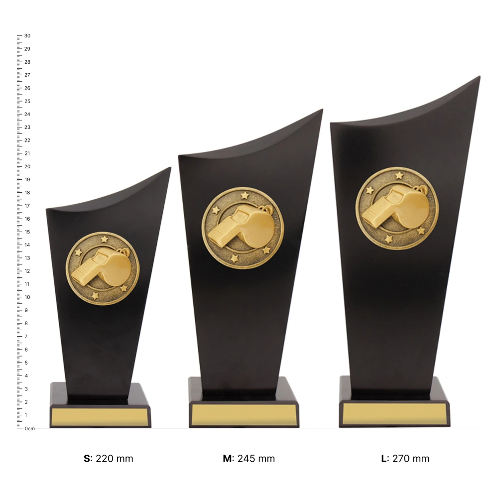 Whistle Spartan Crest trophies next to ruler