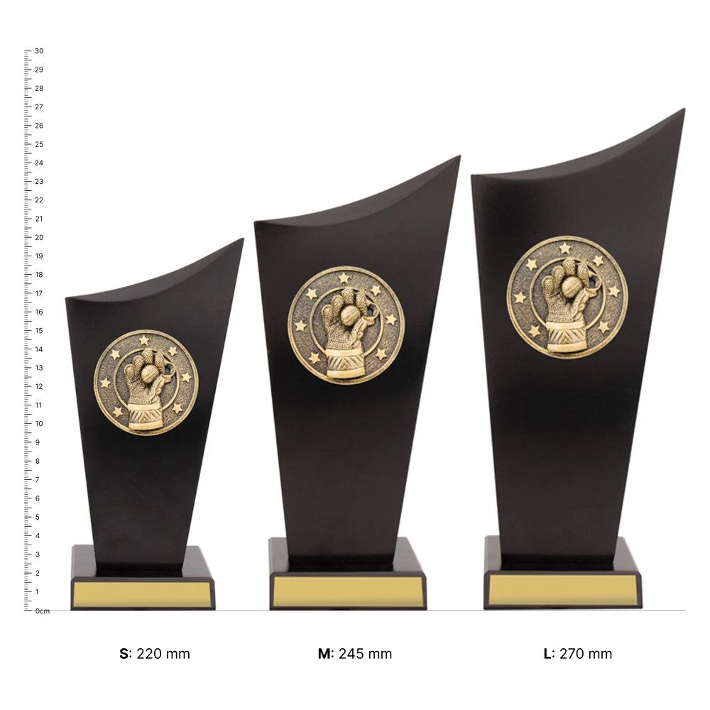 Wicketkeeper Spartan Crest trophies next to ruler