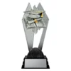 black and silver trophy with graduation cap and books