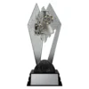 black and silver trophy with flask and items